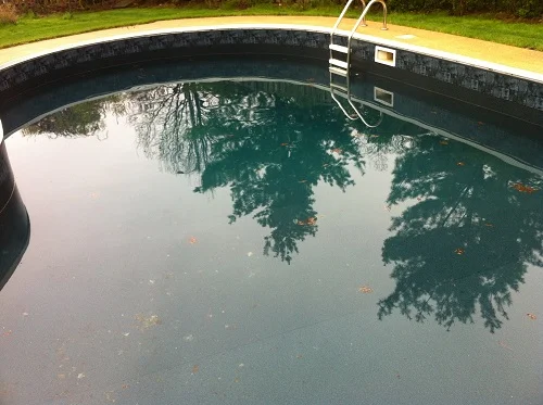 water looks blue in black pool