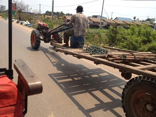 strange vehicle driving in Cambodia