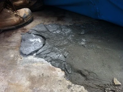 Concrete patch under vinyl liner