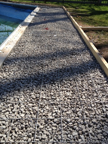 preparing to pour concrete pool deck