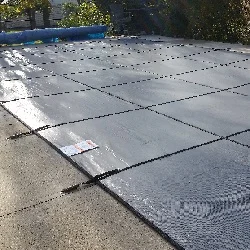 rectangle pool with 

diving board safety cover installation progress pictures