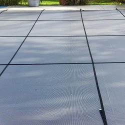 rectangle pool with 

diving board safety cover installation progress pictures