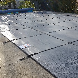 rectangle pool with
diving board safety cover installation progress pictures