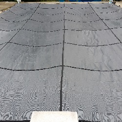 rectangle pool with diving
board safety cover installation progress pictures