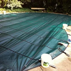 kidney pool safety cover install 

progress pictures