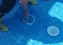 installing a main drain liner