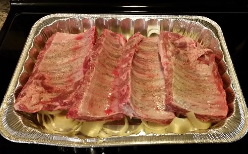 ribs on top of diced onions