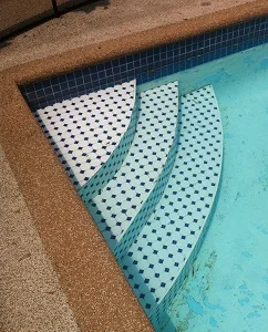 Pool tile step repairs