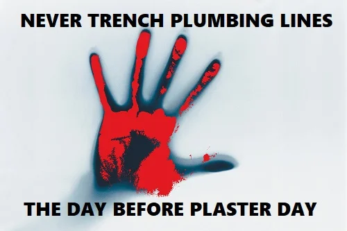 bloody hand prints on plaster