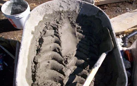 wheelbarrow with concrete